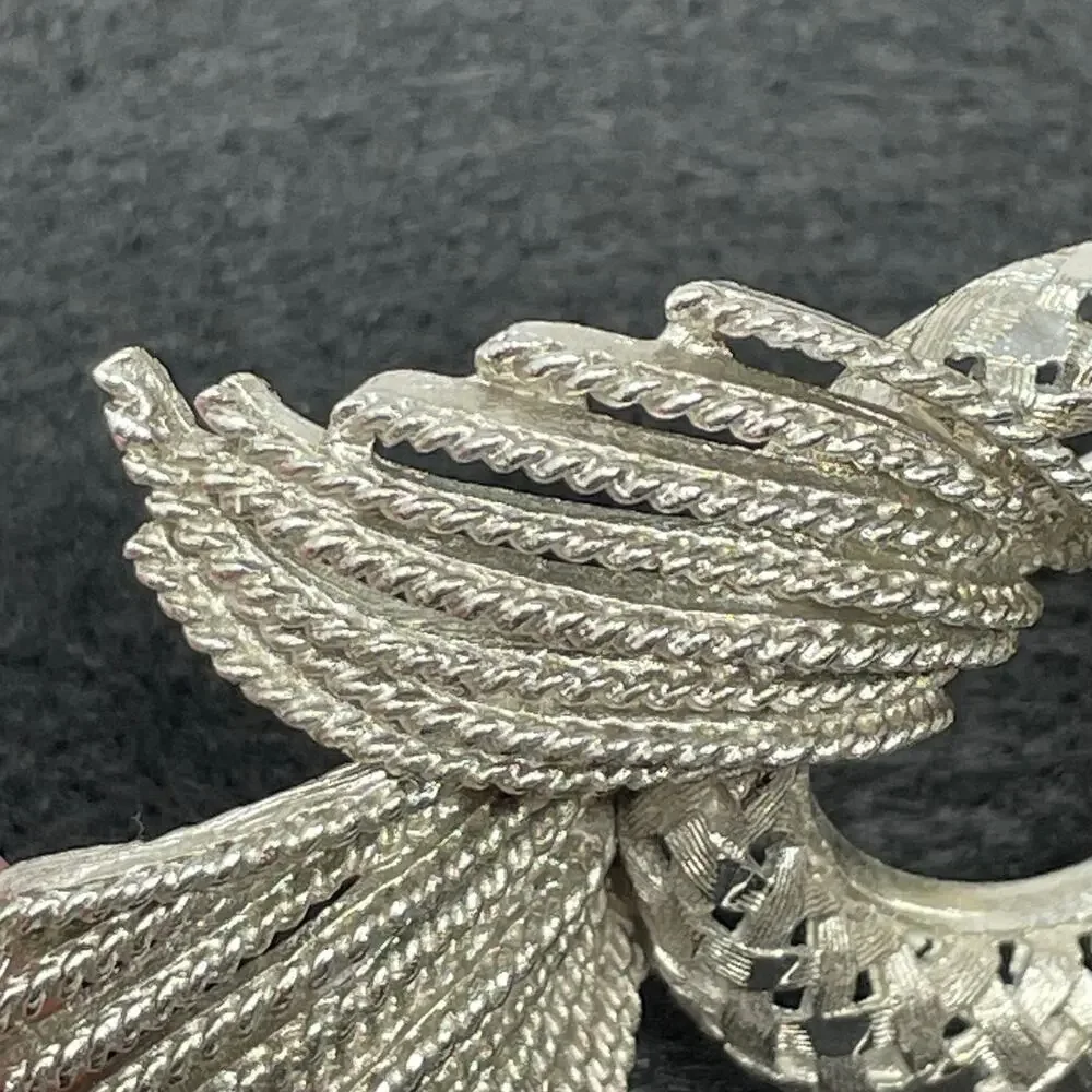 BSK Vintage Brooch Silver Tone Metal Openwork Ring With Textured Rope Spray